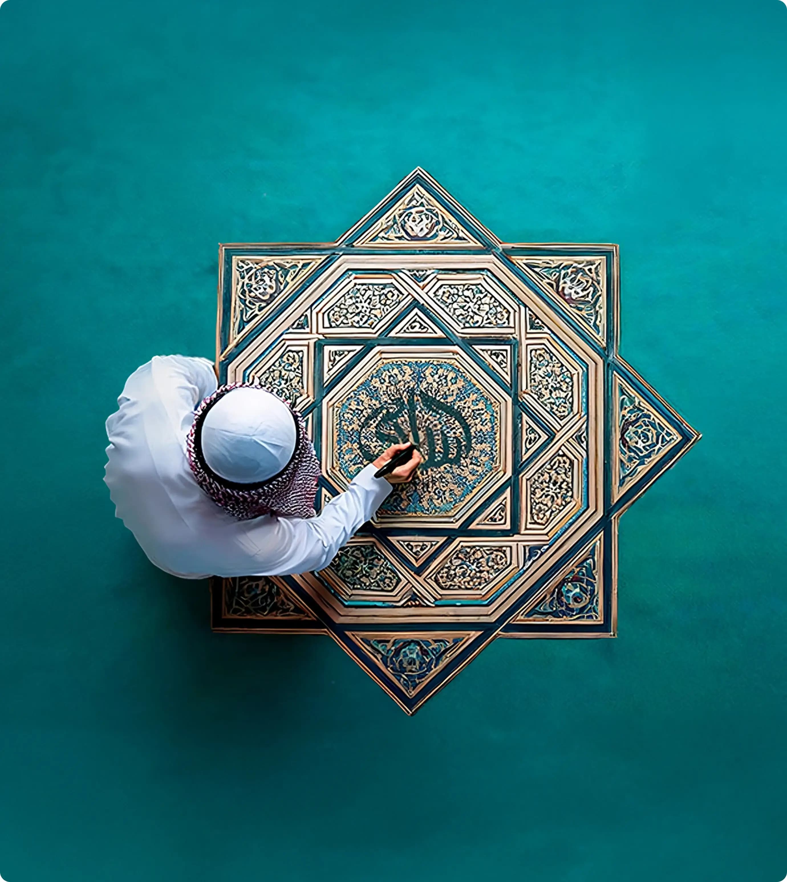 A Muslim man writing Arabic calligraphy on an intricate Islamic geometric pattern.